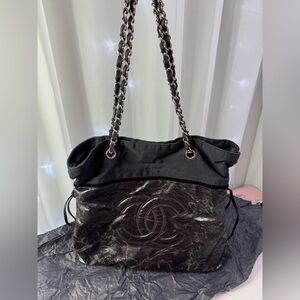 Authentic Chanel Black Shoulder Bag with Quilted Elegance with wear outside